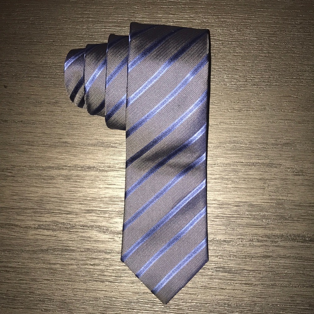 Men’s tie. Dark grey with blue stripes.